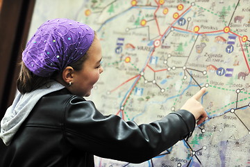 Image showing girl with city map panel