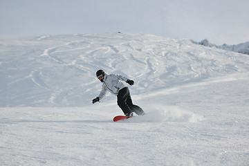 Image showing  skiing on on now at winter season