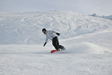 Image showing  skiing on on now at winter season