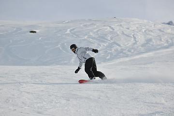 Image showing  skiing on on now at winter season