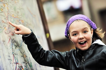 Image showing girl with city map panel