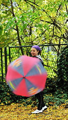 Image showing happy girl with umbrella