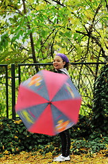 Image showing happy girl with umbrella