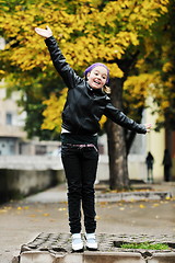 Image showing happy girl with umbrella