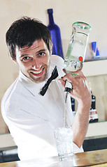 Image showing pro barman prepare coctail drink on party