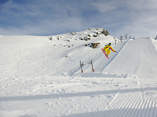 Image showing happy young man have fun at winter on mountain peak