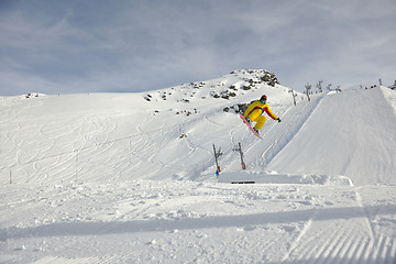 Image showing snowboarder extreme jump