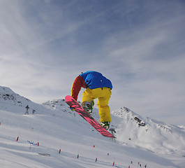 Image showing snowboarder extreme jump