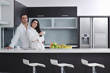 Image showing young couple have fun in modern kitchen