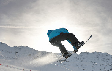 Image showing snowboarder extreme jump