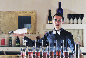 Image showing pro barman prepare coctail drink on party