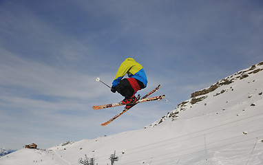 Image showing happy young man have fun at winter on mountain peak