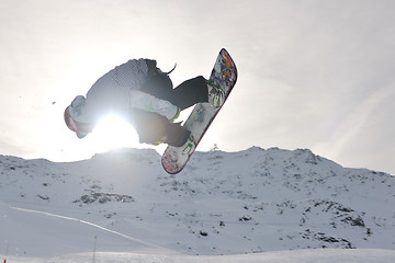 Image showing snowboarder extreme jump