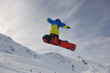 Image showing snowboarder extreme jump