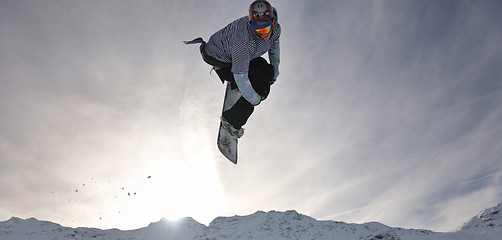 Image showing snowboarder extreme jump