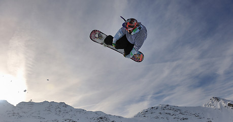 Image showing snowboarder extreme jump