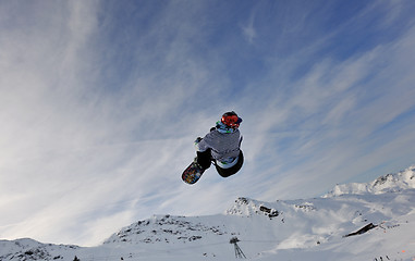 Image showing happy young man have fun at winter on mountain peak