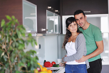 Image showing young couple have fun in modern kitchen