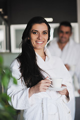 Image showing Young love couple taking fresh morning cup of coffee