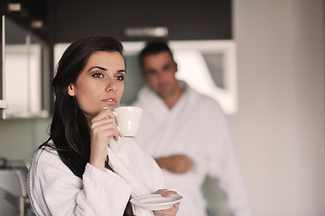 Image showing Young love couple taking fresh morning cup of coffee