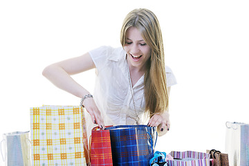 Image showing happy young adult women  shopping with colored bags