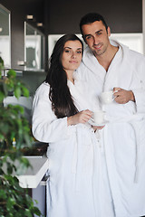 Image showing Young love couple taking fresh morning cup of coffee