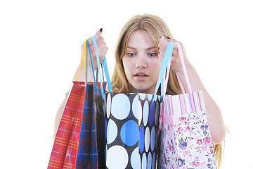 Image showing happy young adult women  shopping with colored bags