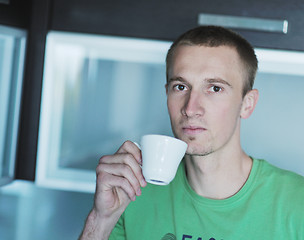 Image showing handsome young man drink fresh morning coffee