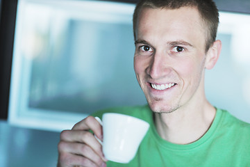 Image showing handsome young man drink fresh morning coffee