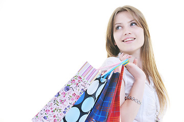 Image showing happy young adult women  shopping with colored bags