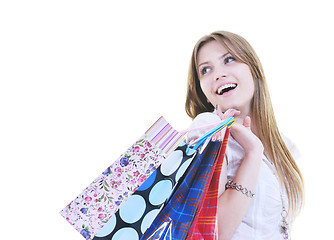 Image showing happy young adult women  shopping with colored bags