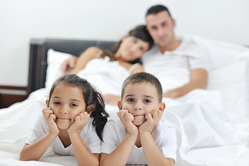 Image showing happy young Family in their bedroom