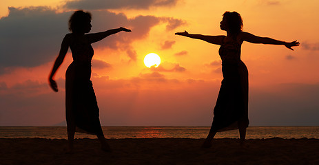 Image showing Women at sunset