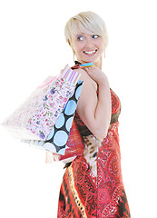 Image showing happy young adult women  shopping with colored bags