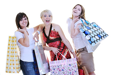 Image showing happy young adult women  shopping with colored bags