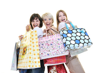 Image showing happy young adult women  shopping with colored bags