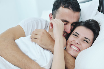 Image showing young couple have good time in their bedroom