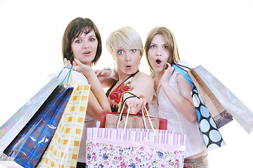 Image showing happy young adult women  shopping with colored bags