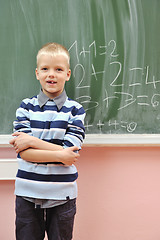 Image showing happy young boy at first grade math classes 