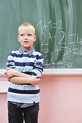 Image showing happy young boy at first grade math classes 