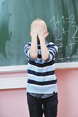 Image showing happy young boy at first grade math classes 