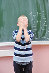 Image showing happy young boy at first grade math classes 