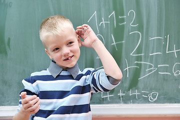 Image showing happy young boy at first grade math classes 