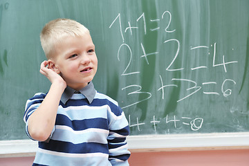 Image showing happy young boy at first grade math classes 