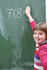 Image showing happy school girl on math classes