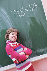 Image showing happy school girl on math classes