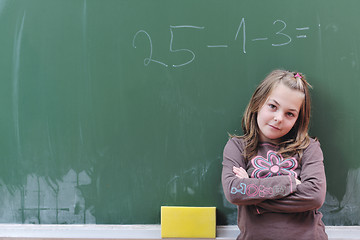 Image showing happy school girl on math classes