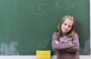 Image showing happy school girl on math classes