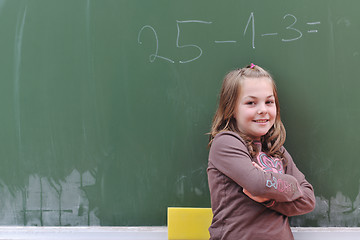 Image showing happy school girl on math classes