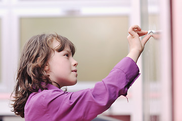 Image showing happy school girl on math classes